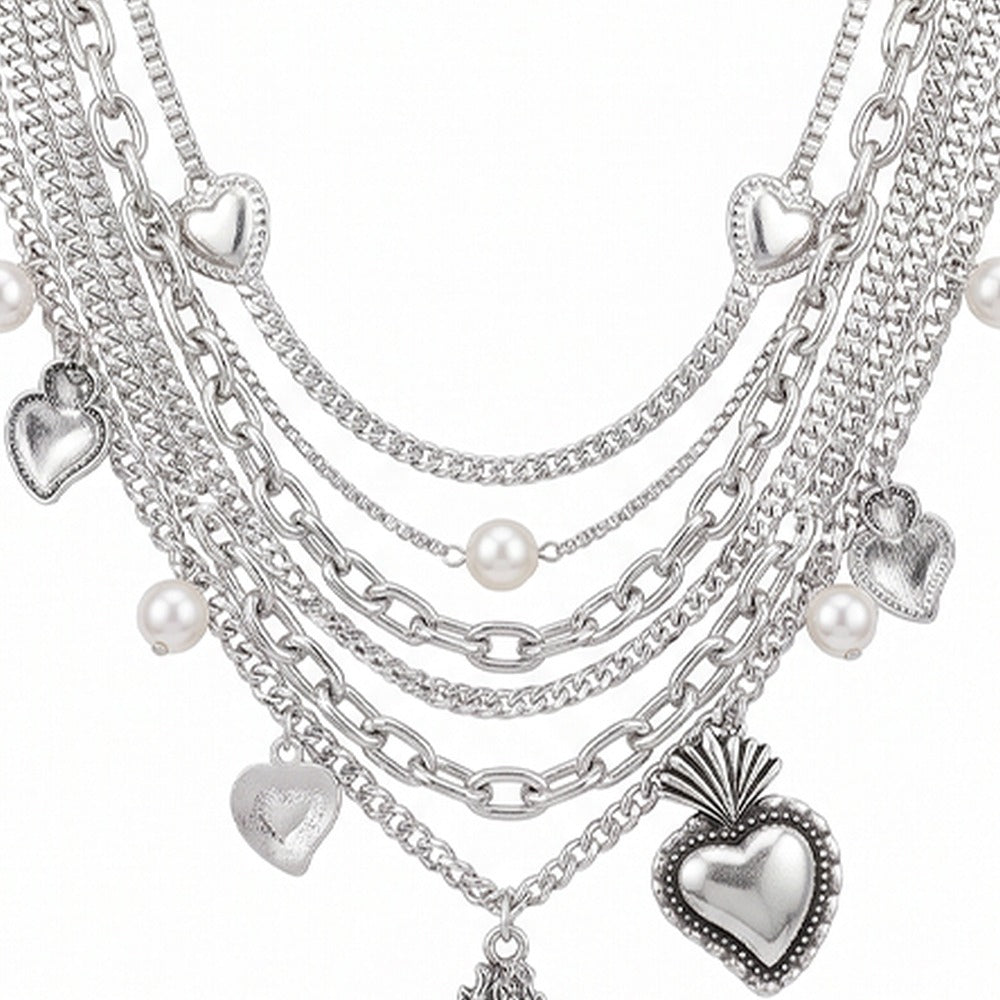 COLLANA LUNGA MULTIFILO CON CUORI SACRI E MONETA