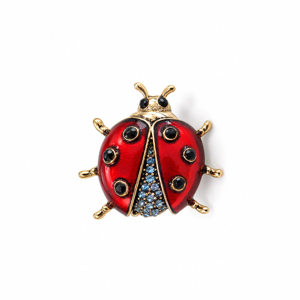 SPILLA CON COCCINELLA RICOPERTA DA STRASS DI DIVERSE GRANDEZZE E COLORI