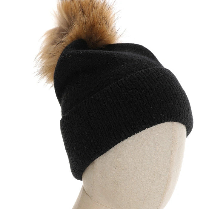 CAPPELLO A CUFFIA CON PON PON IN PELLICCIA