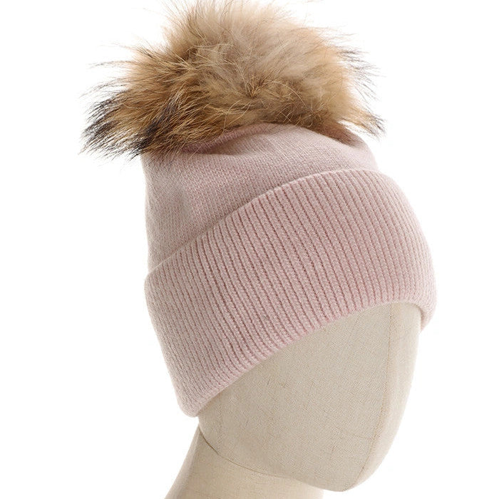 CAPPELLO A CUFFIA CON PON PON IN PELLICCIA