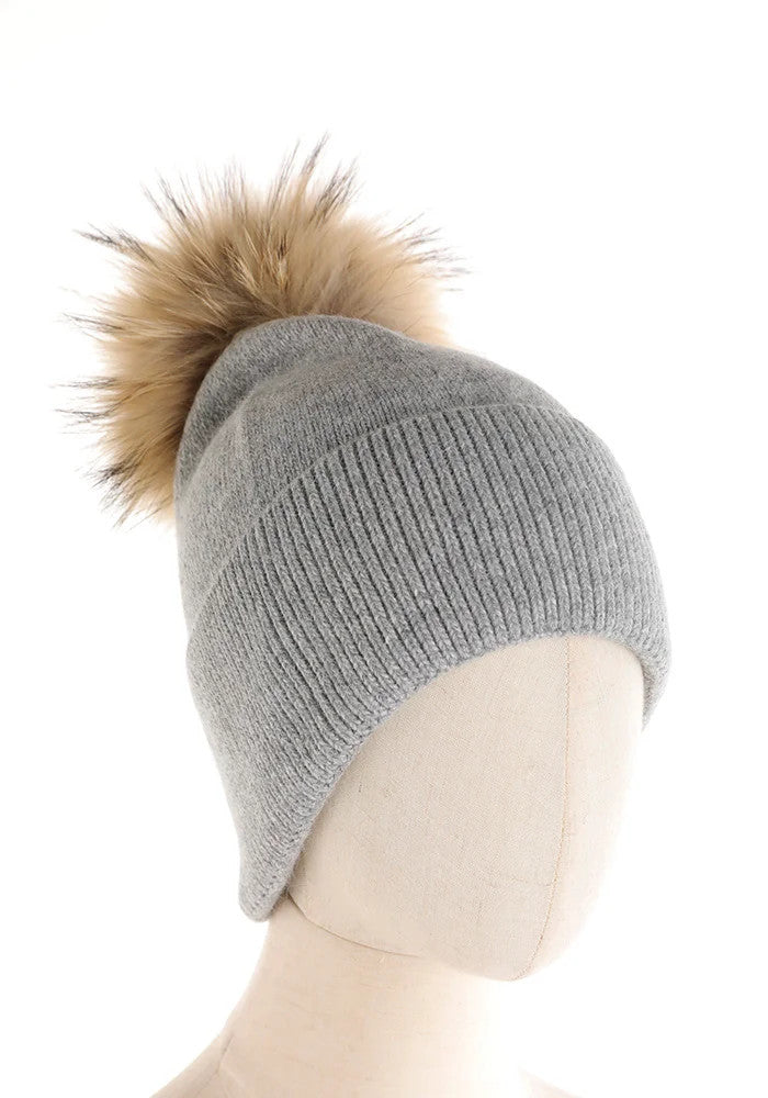 CAPPELLO A CUFFIA CON PON PON IN PELLICCIA