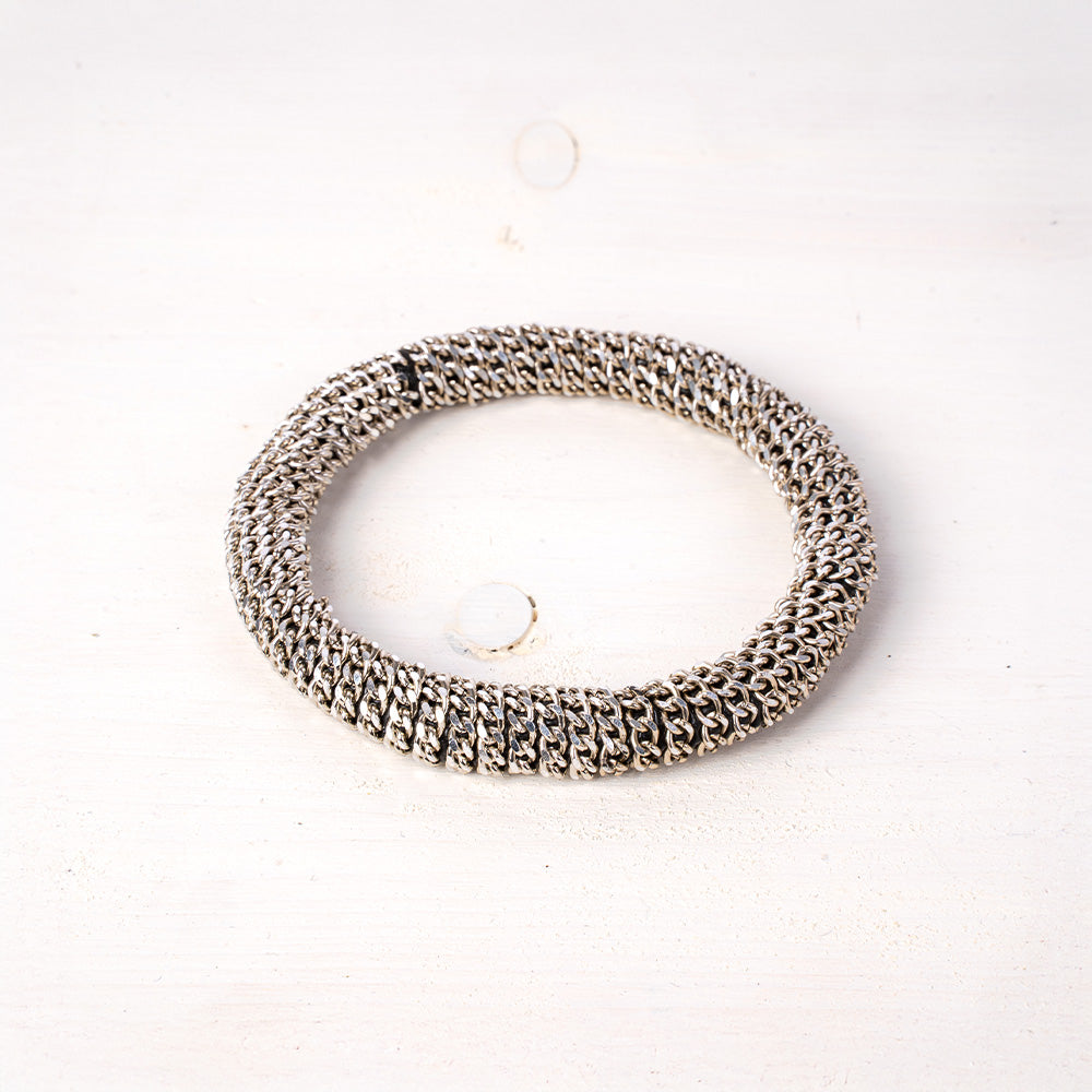 BRACCIALE RIGIDO RIVESTITO DI CATENE