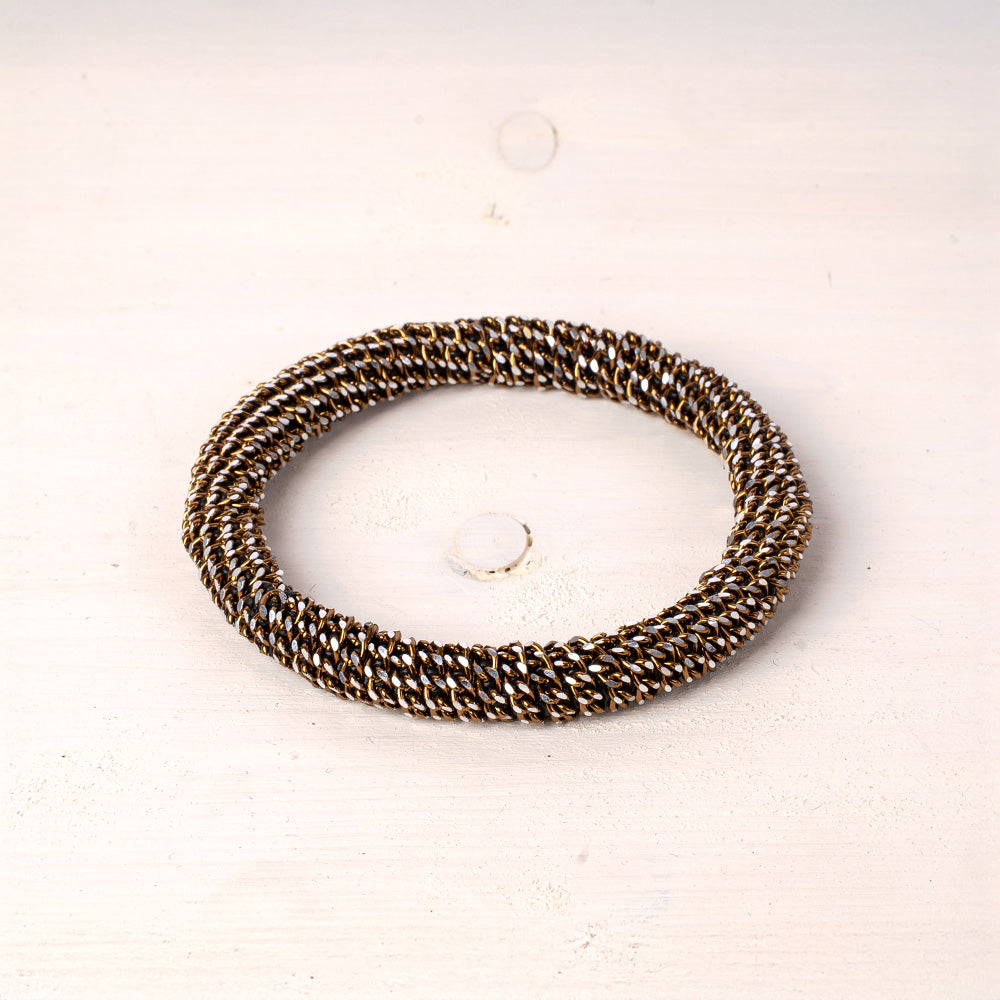 BRACCIALE RIGIDO RIVESTITO DI CATENE