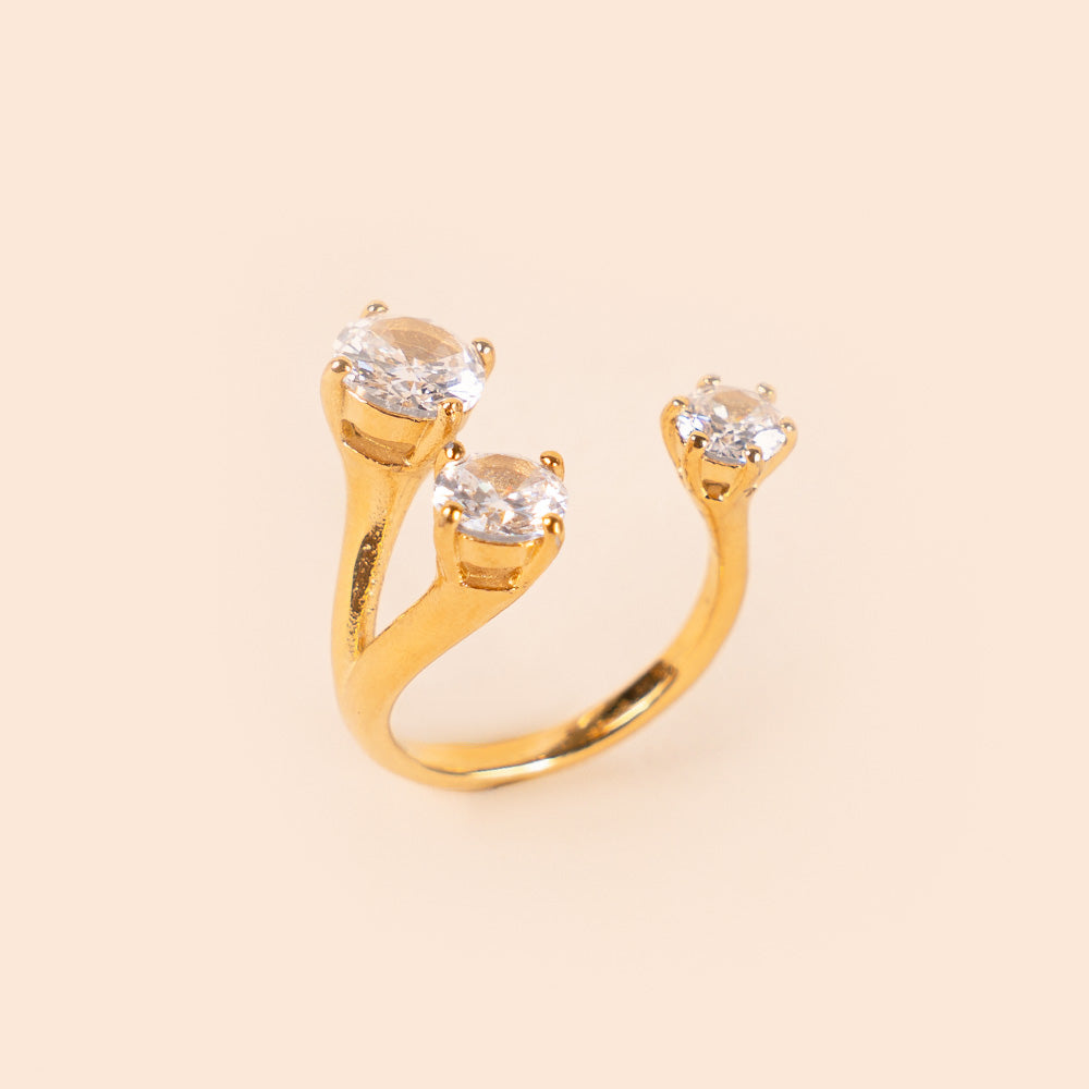 ANELLO REGOLABILE CON TRE STRASS DI DIVERSE DIMENSIONI