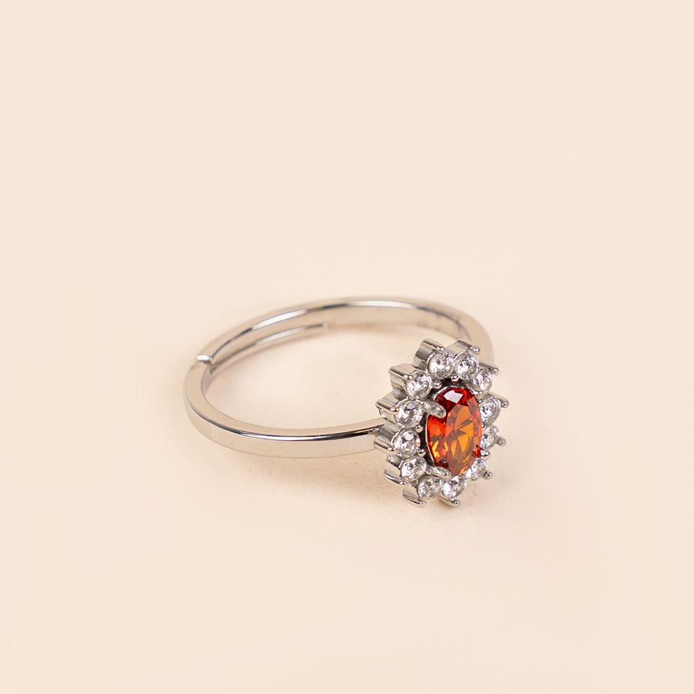 ADJUSTABLE RING WITH RHINESTONE-SURROUNDED LIGHT POINT