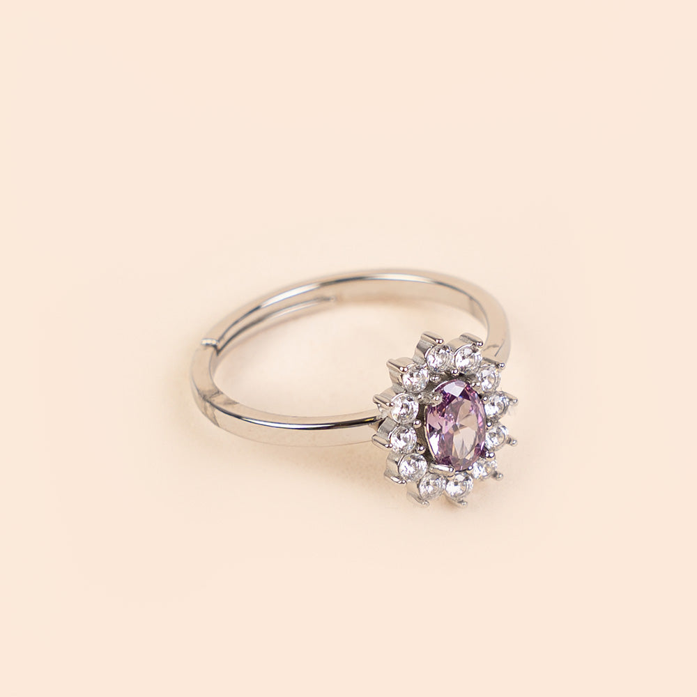 ADJUSTABLE RING WITH RHINESTONE-SURROUNDED LIGHT POINT