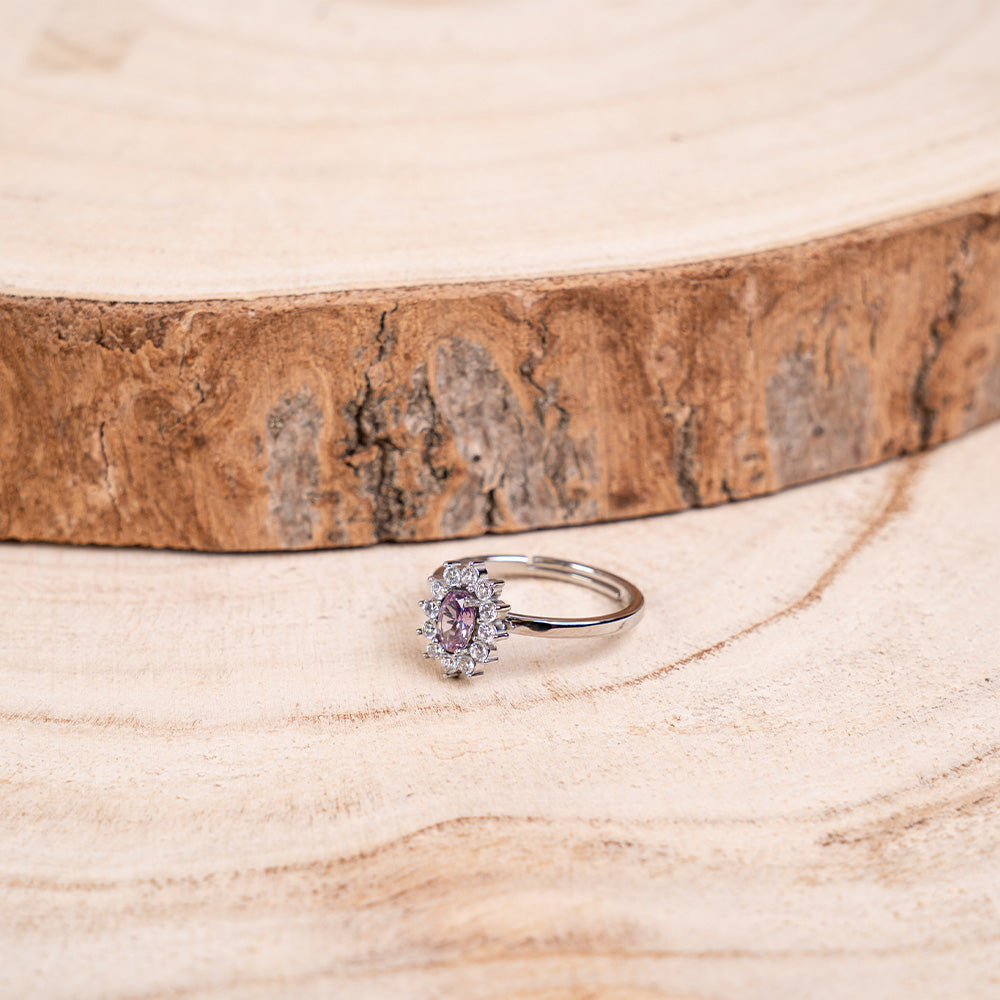 ADJUSTABLE RING WITH RHINESTONE-SURROUNDED LIGHT POINT