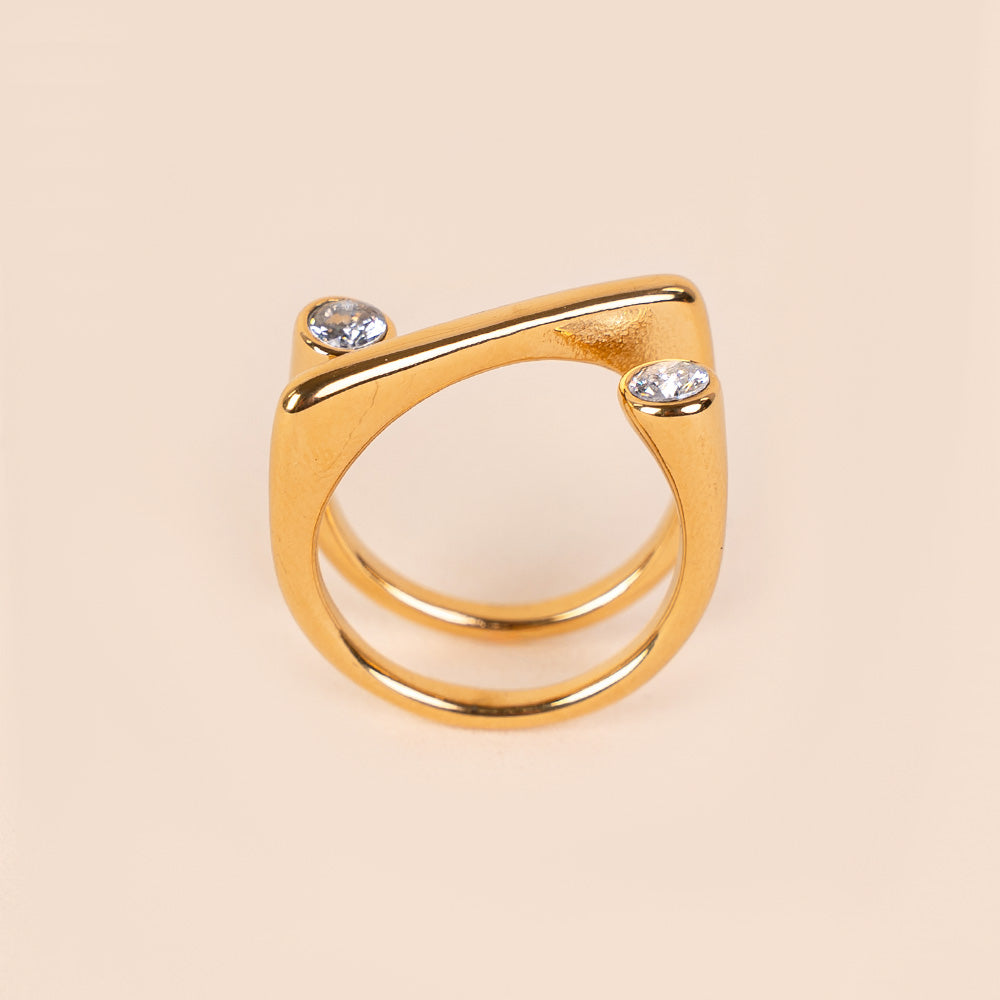 RING WITH OBLIQUE LINE AND RHINESTONES AT THE ENDS