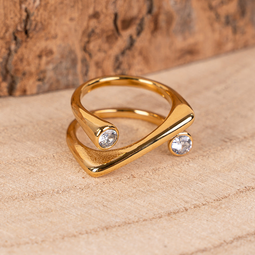 RING WITH OBLIQUE LINE AND RHINESTONES AT THE ENDS