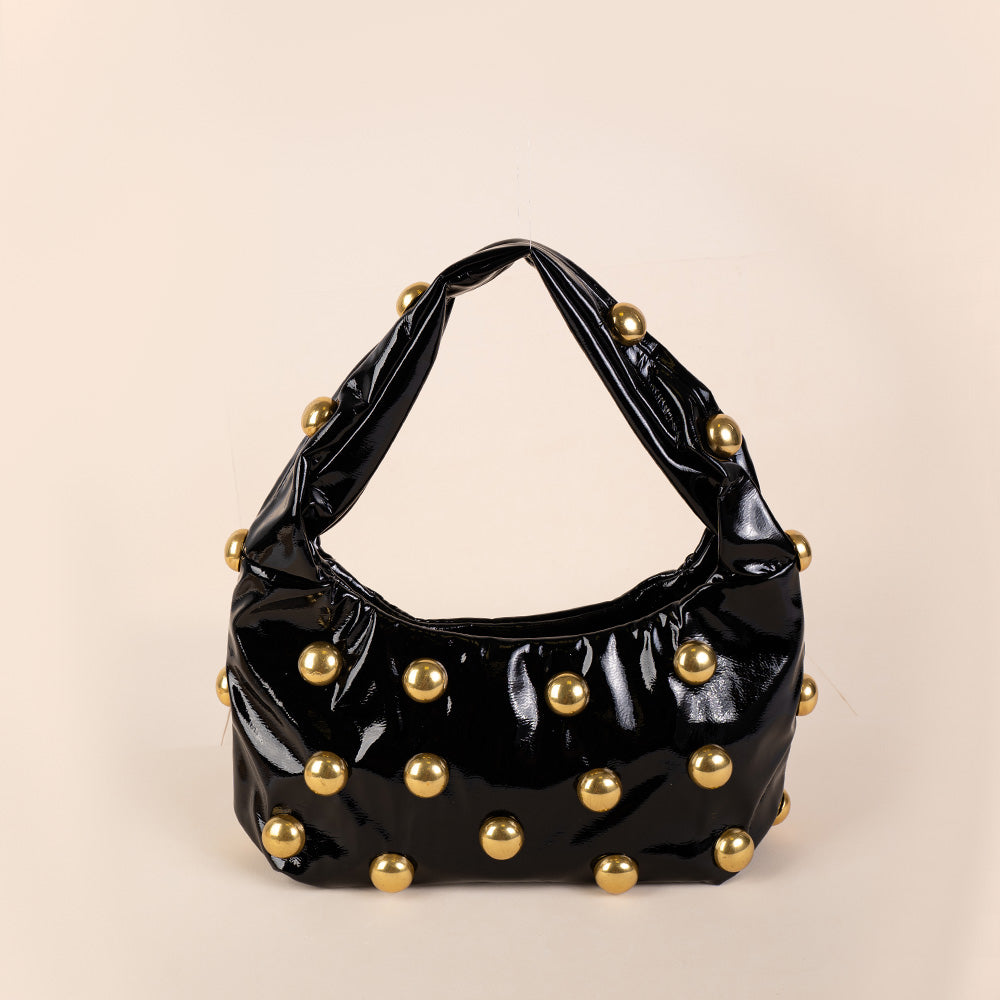 BORSA A MANO IN VERNICE CON BORCHIE A SEMI SFERA