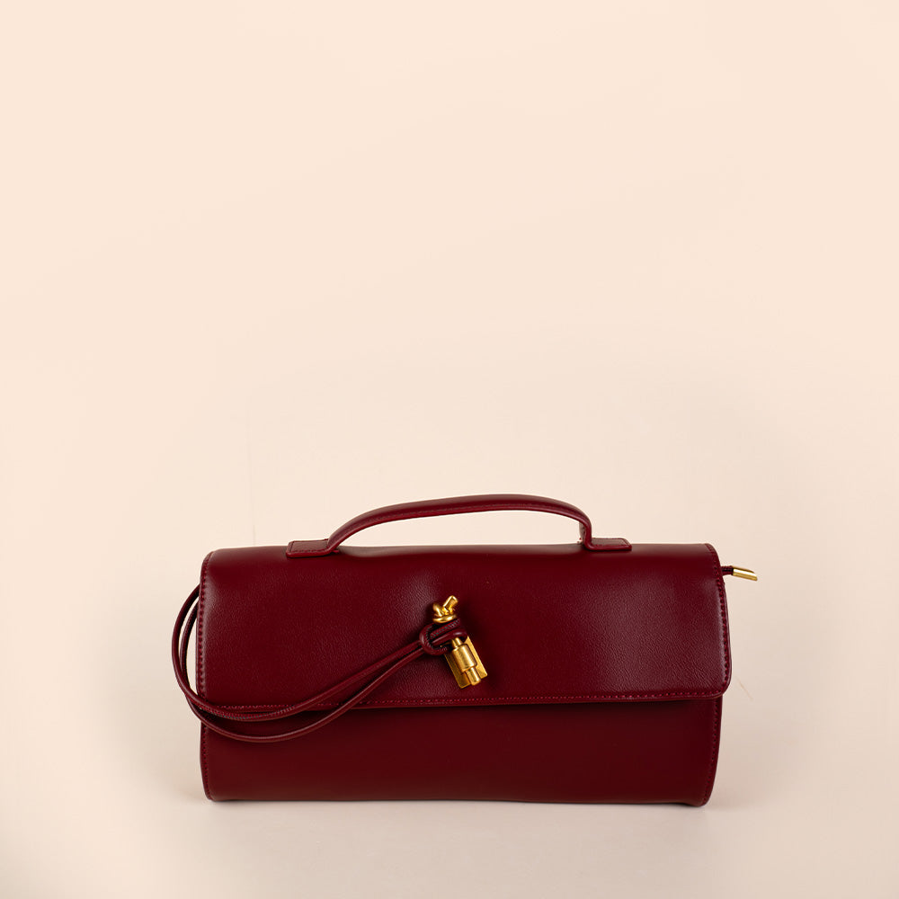 BORSA CLUTCH A MANO CON LACCIO SU CHIUSURA E TRACOLLA