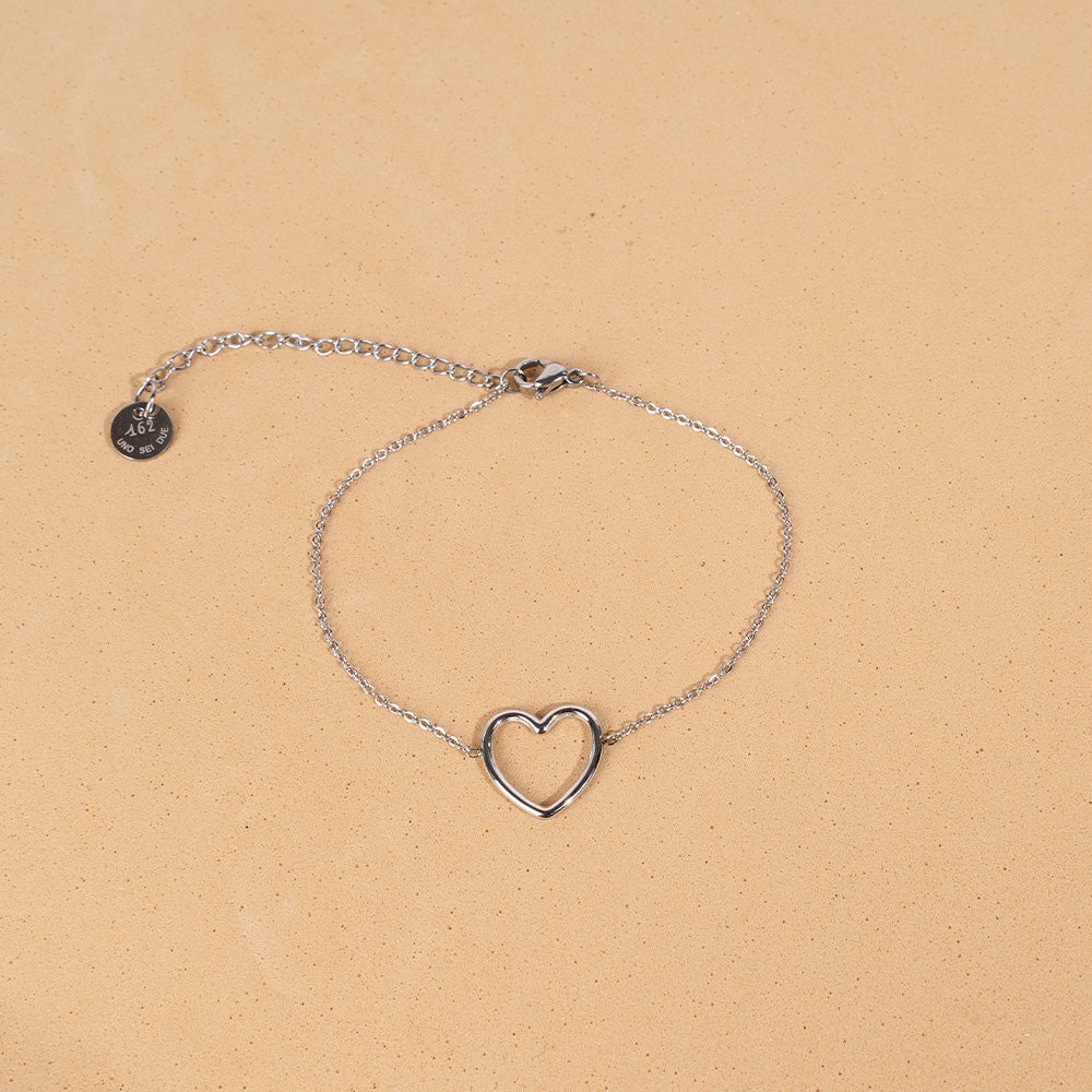 BRACCIALE MORBIDO CON CUORE VUOTO PENDENTE