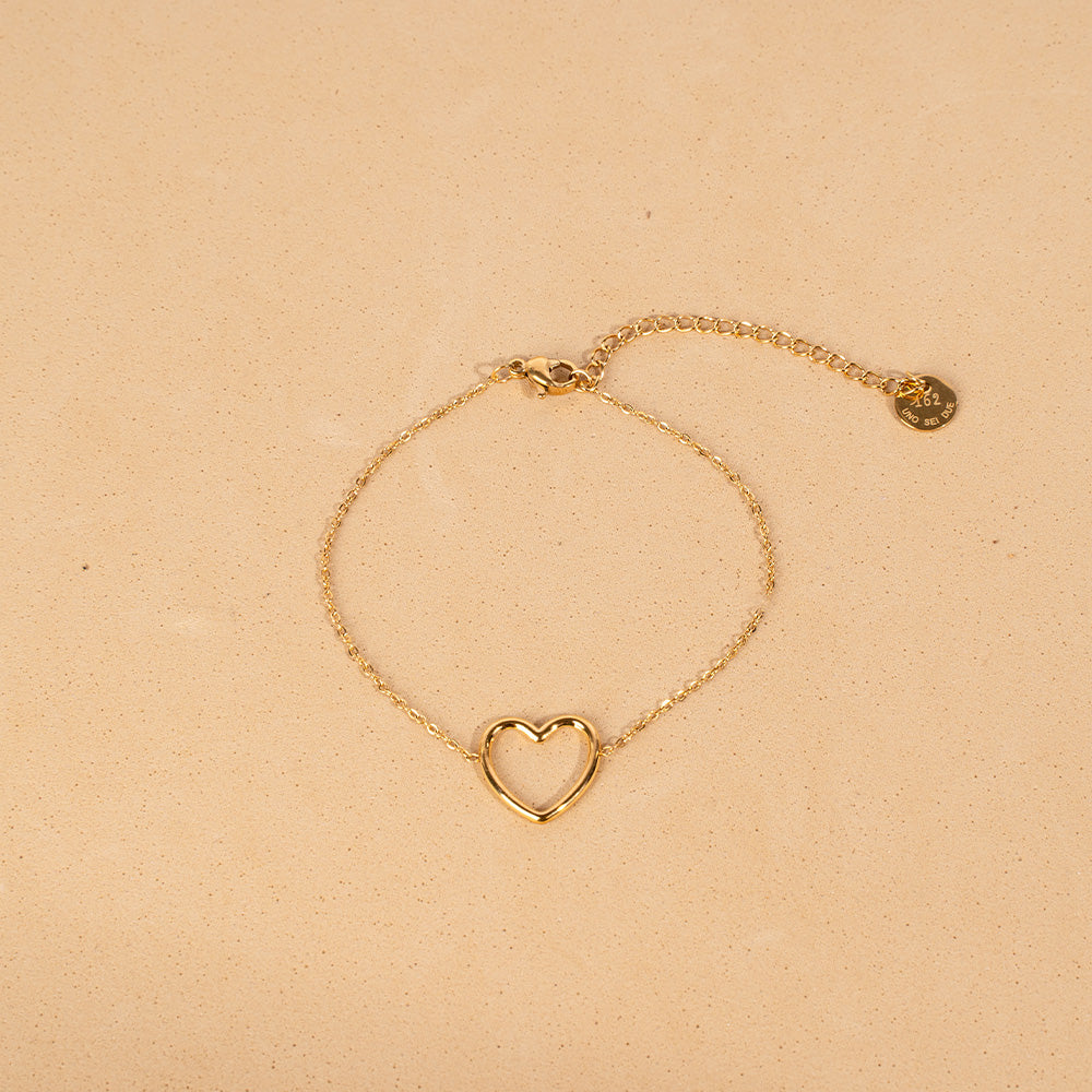 BRACCIALE MORBIDO CON CUORE VUOTO PENDENTE