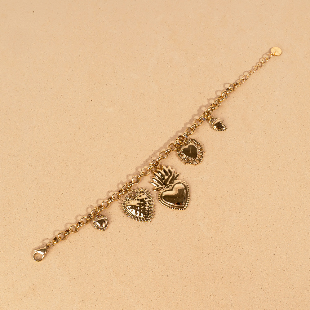 BRACCIALE MORBIDO CON CINQUE CUORI SACRI PENDENTI