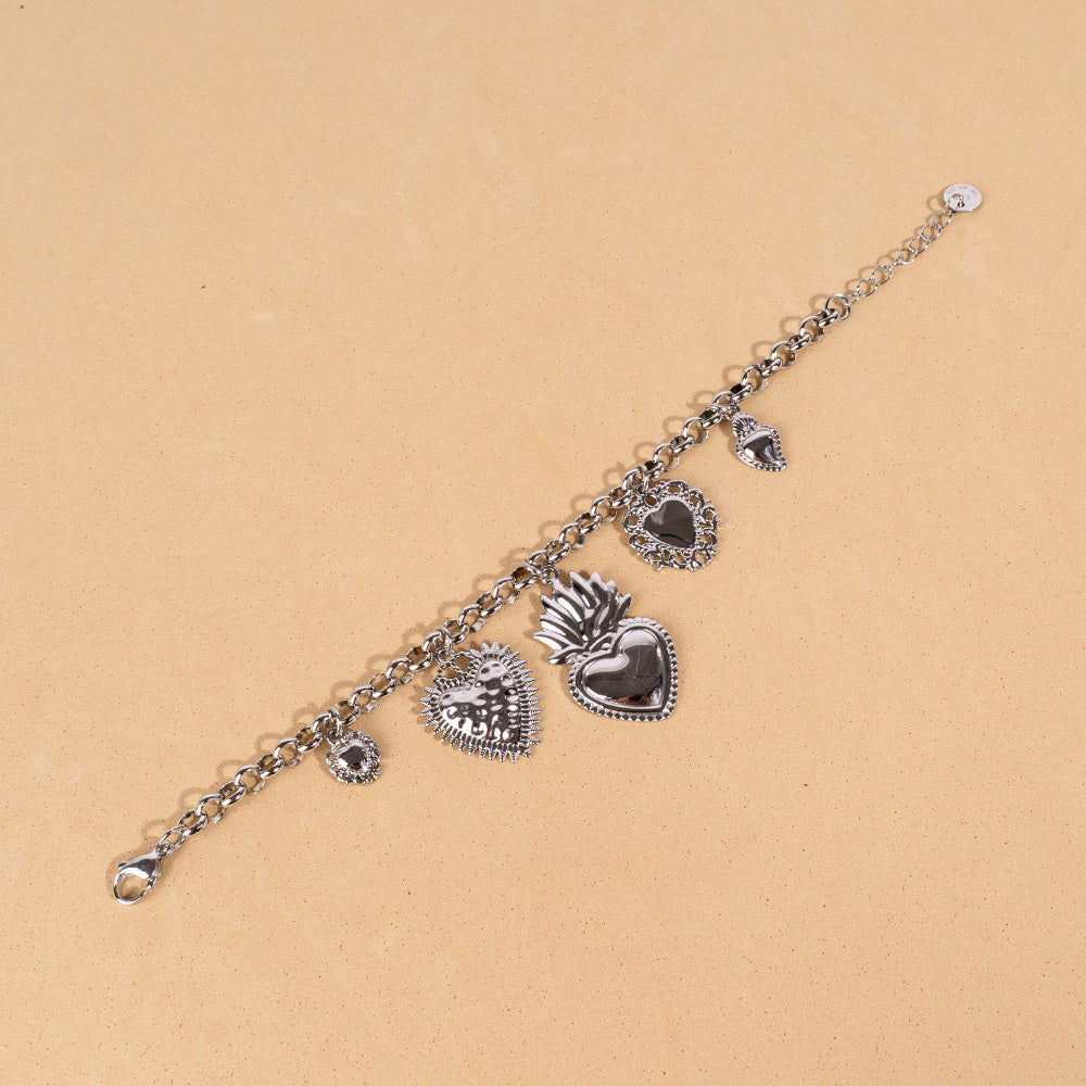 BRACCIALE MORBIDO CON CINQUE CUORI SACRI PENDENTI