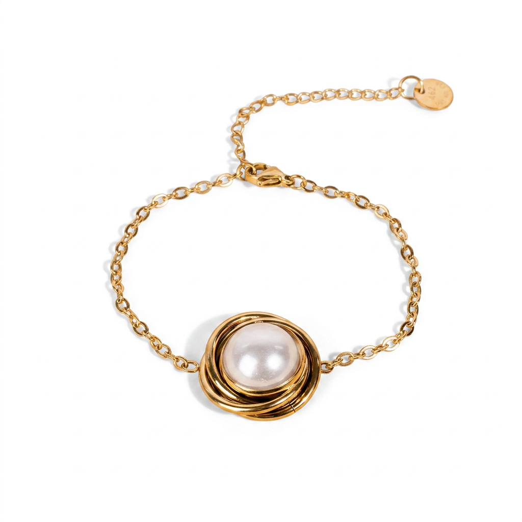 BRACELET WITH CIRCULAR DECORATION AND PEARL