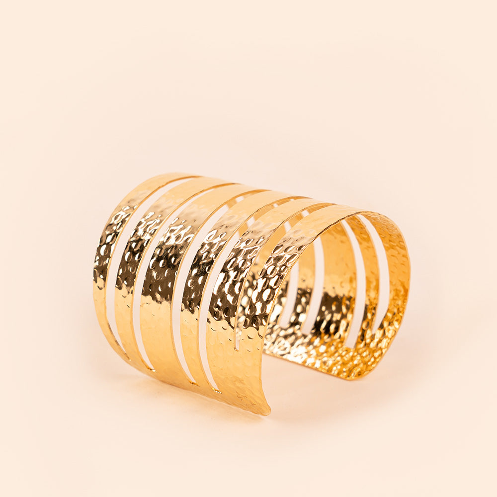BRACCIALE RIGIDO CON FASCE MARTELLATE