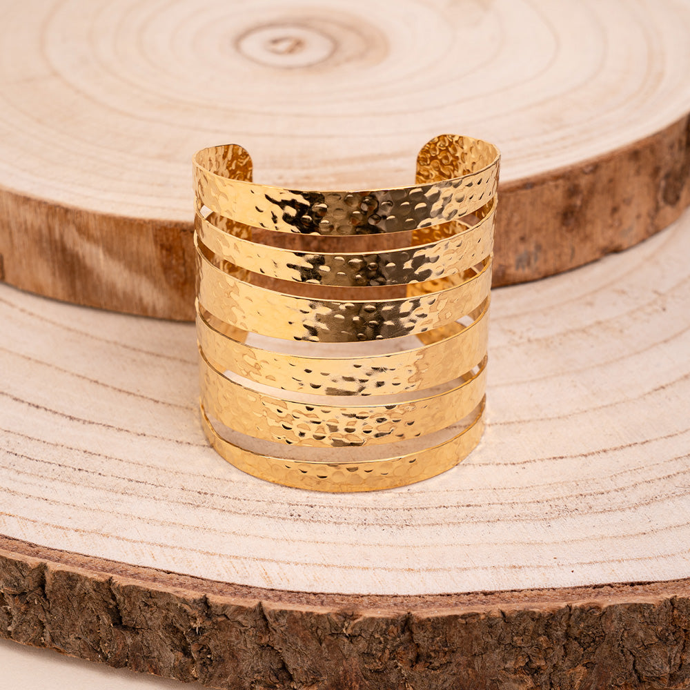 BRACCIALE RIGIDO CON FASCE MARTELLATE