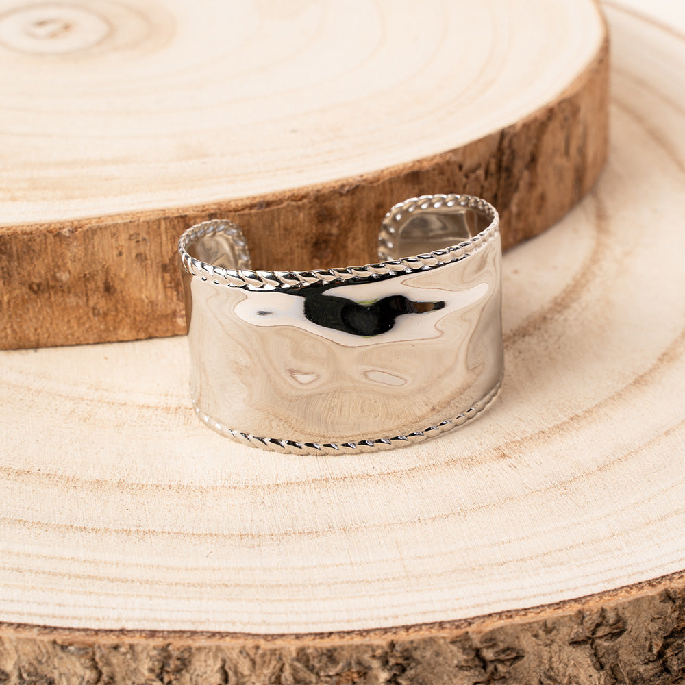 BRACCIALE RIGIDO MARTELLATO CON CORNICE