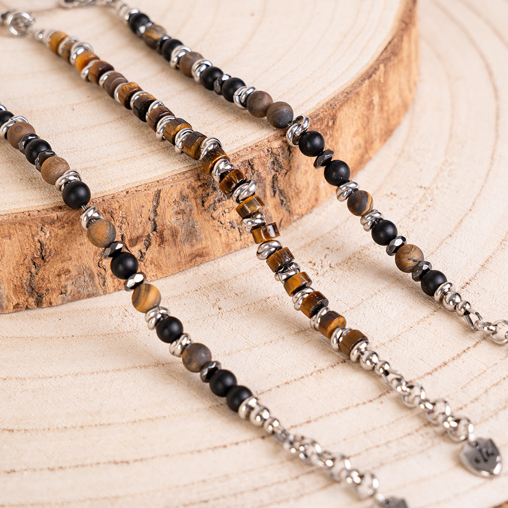 BRACCIALE CON PIETRE DURE E INSERTI INTRECCIATI