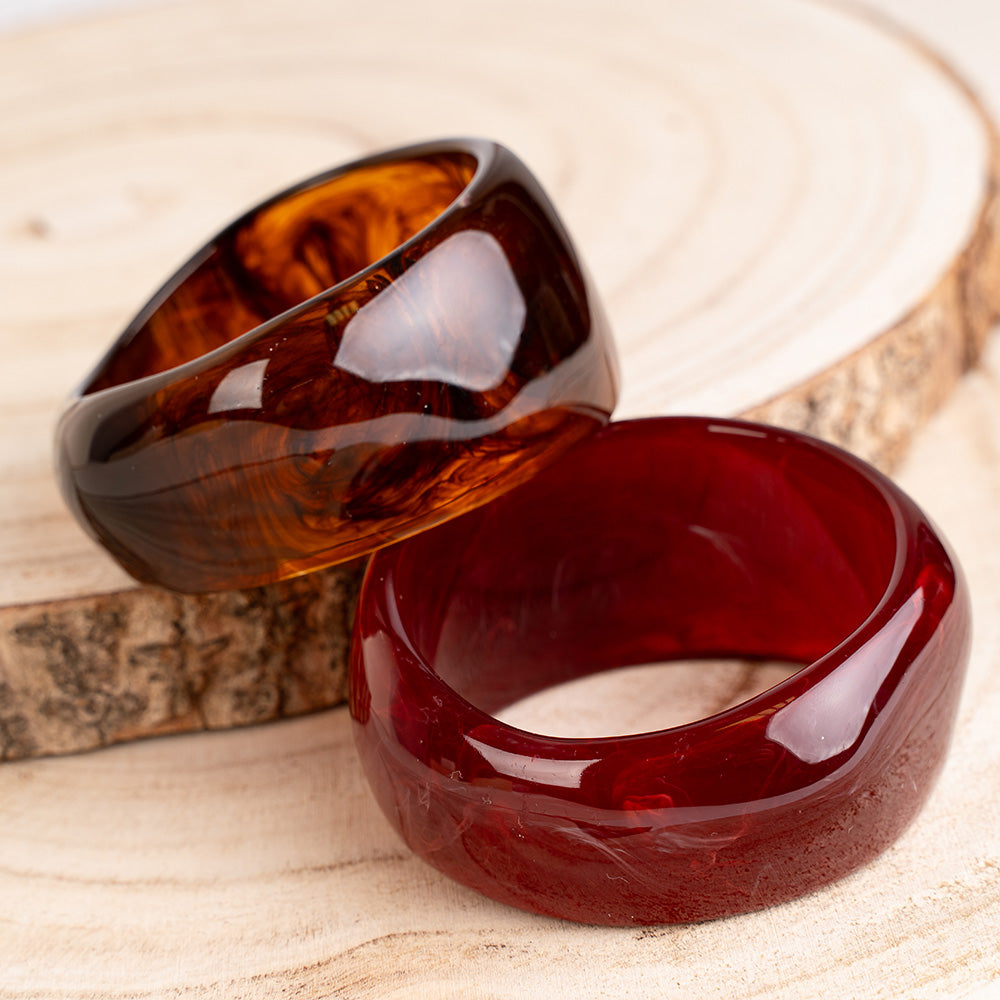 BRACCIALE RIGIDO ASIMMETRICO IN RESINA COLORATA