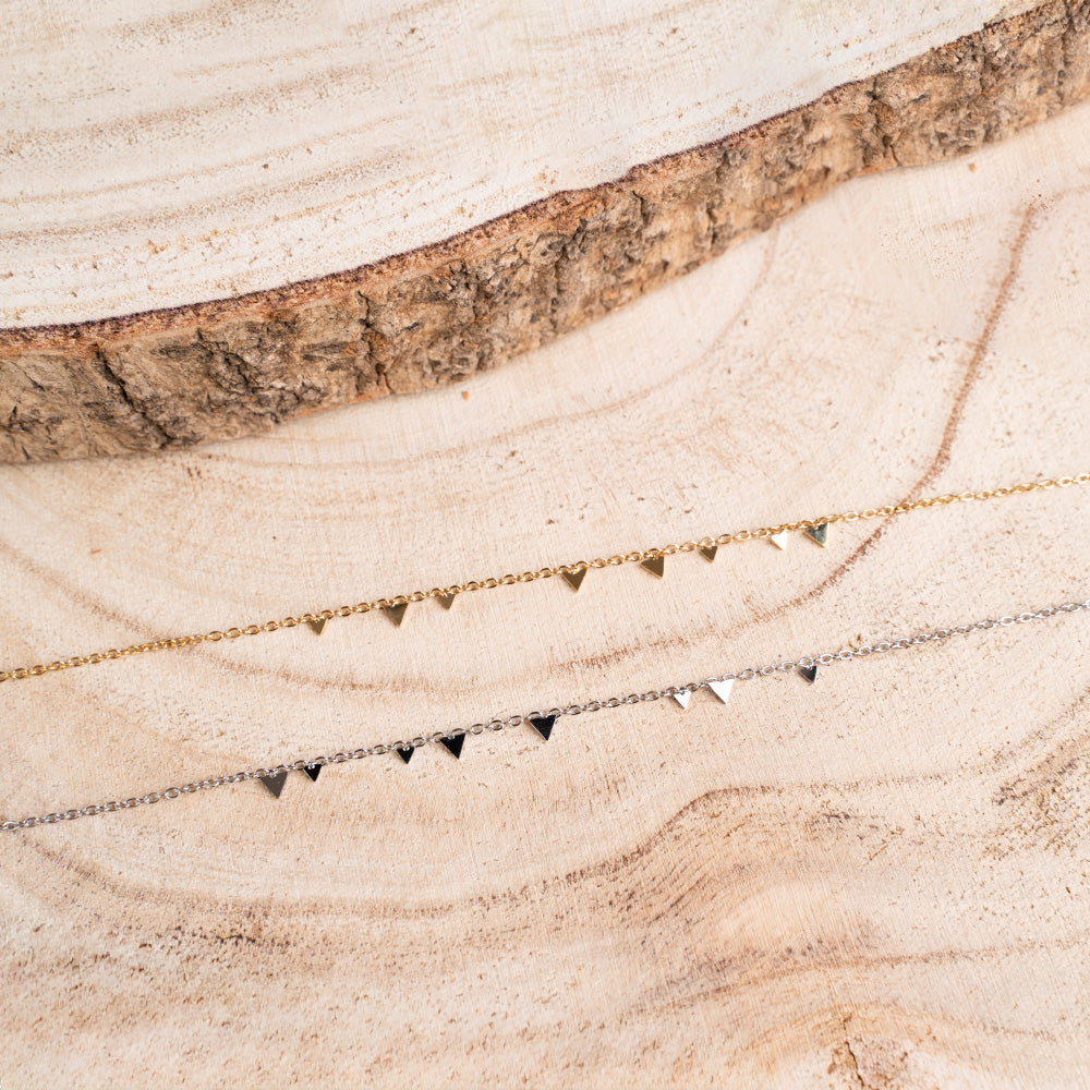 BRACCIALE FINO CON TRIANGOLINI PENDENTI