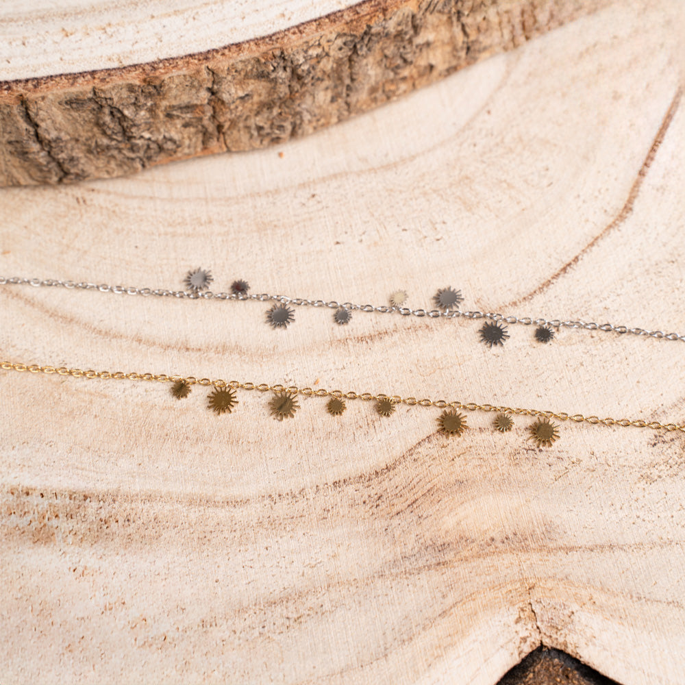 BRACCIALE FINO CON PICCOLI SOLI PENDENTI