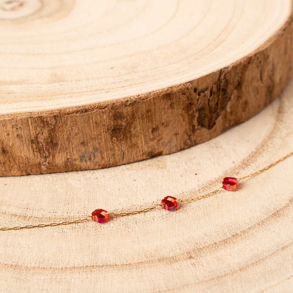 BRACCIALE A CATENA SOTTILE CON TRE PERLINE A FIORE