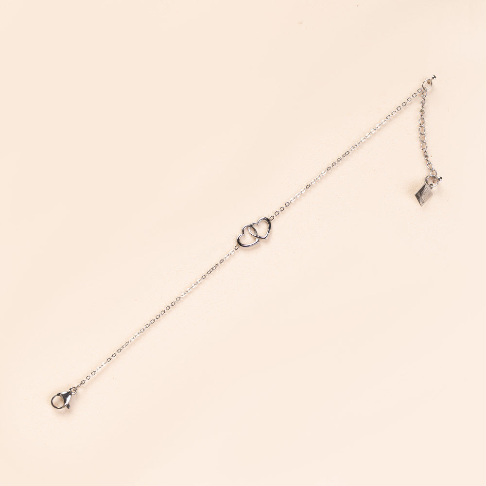 BRACCIALE MORBIDO A CATENA CON DOPPI CUORI