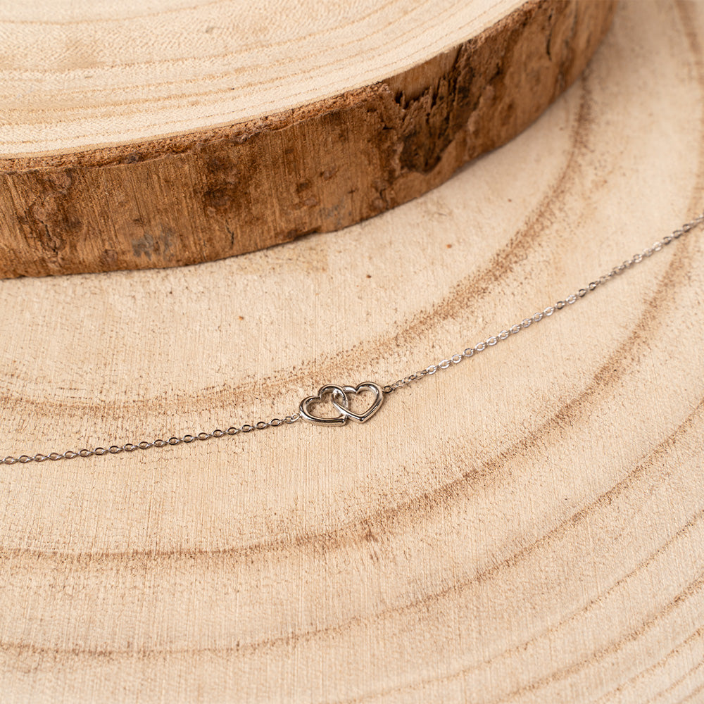 BRACCIALE MORBIDO A CATENA CON DOPPI CUORI