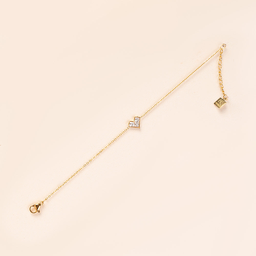 BRACCIALE MORBIDO A CATENA CON CUORE GEOMETRICO