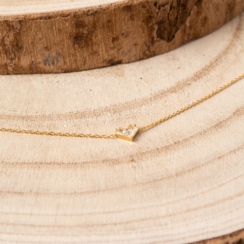 BRACCIALE MORBIDO A CATENA CON CUORE GEOMETRICO