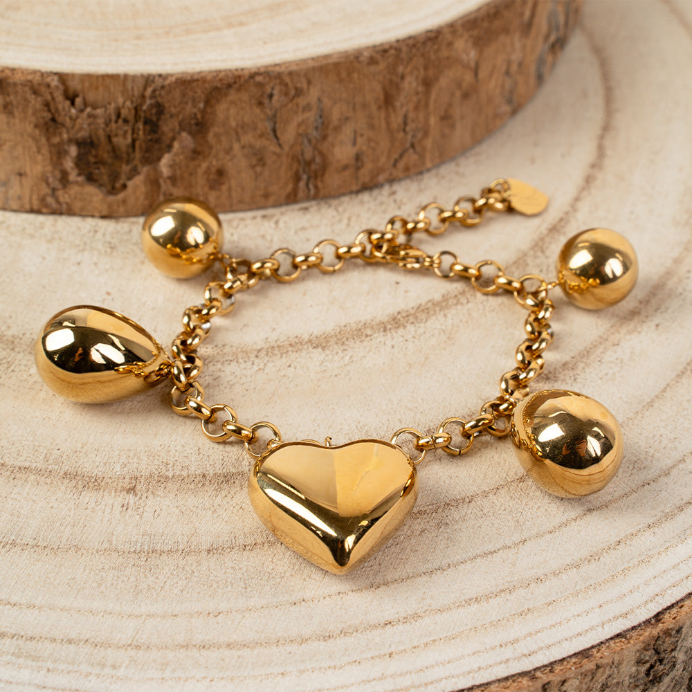 BRACCIALE CON GOCCE SFERE E CUORE CENTRALE