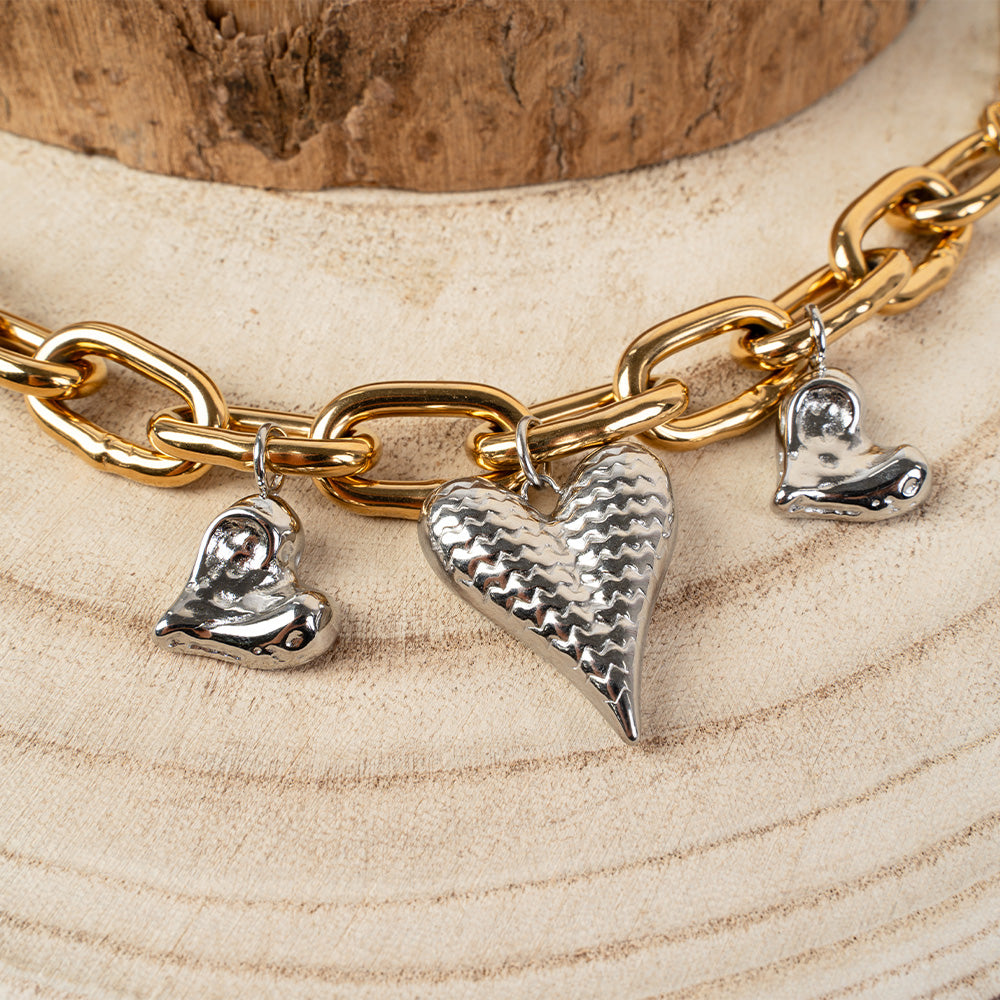 BRACCIALE A CATENA SPESSA CON PENDENTI A CUORE