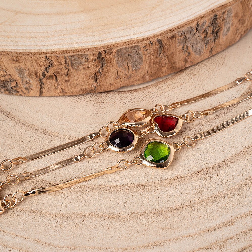 BRACCIALE CON TRE FILE BASE SNAKE E PIETRE CENTRALI