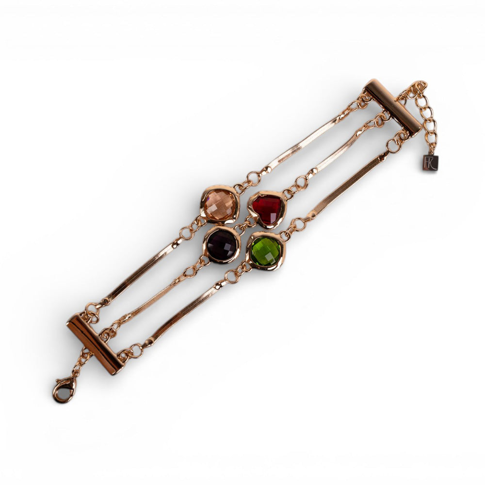 BRACCIALE CON TRE FILE BASE SNAKE E PIETRE CENTRALI