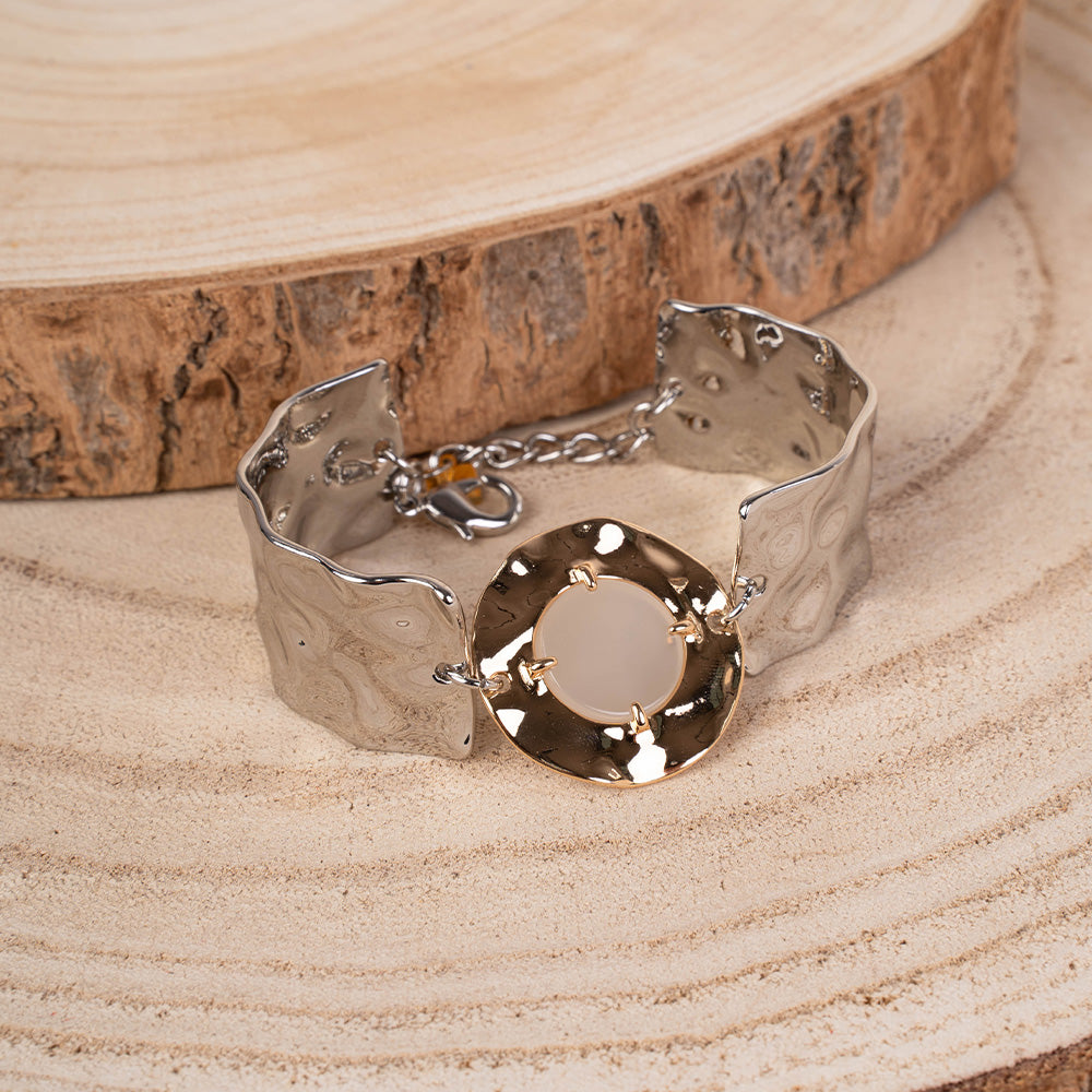 BRACCIALE CON UNITA' RIGIDE MARTELLATE E PIETRA CENTRALE