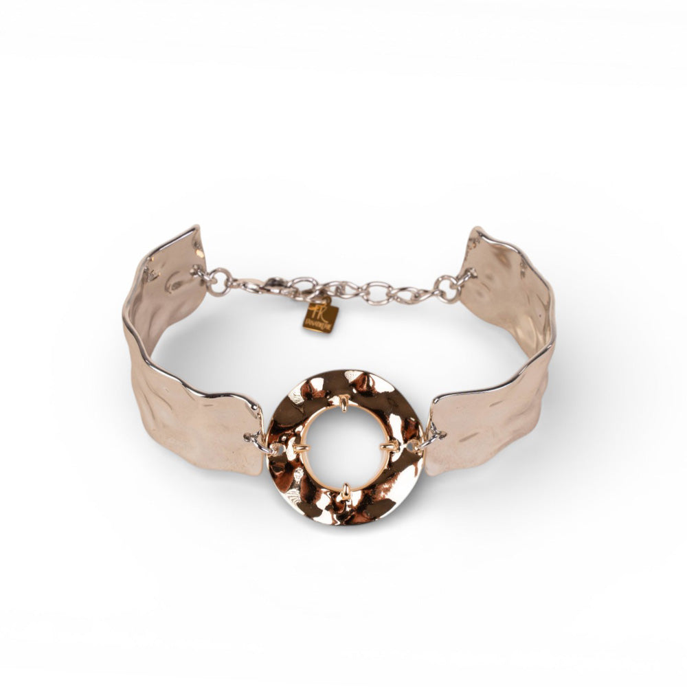 BRACCIALE CON UNITA' RIGIDE MARTELLATE E PIETRA CENTRALE