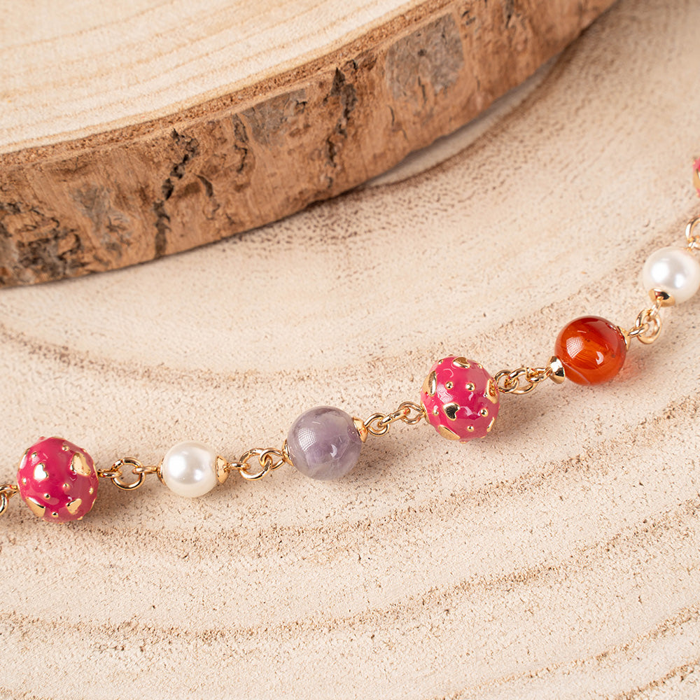 BRACCIALE CON PIETRE E SFERE CON CUORI