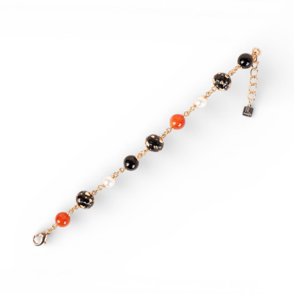 BRACCIALE CON PIETRE E SFERE CON CUORI