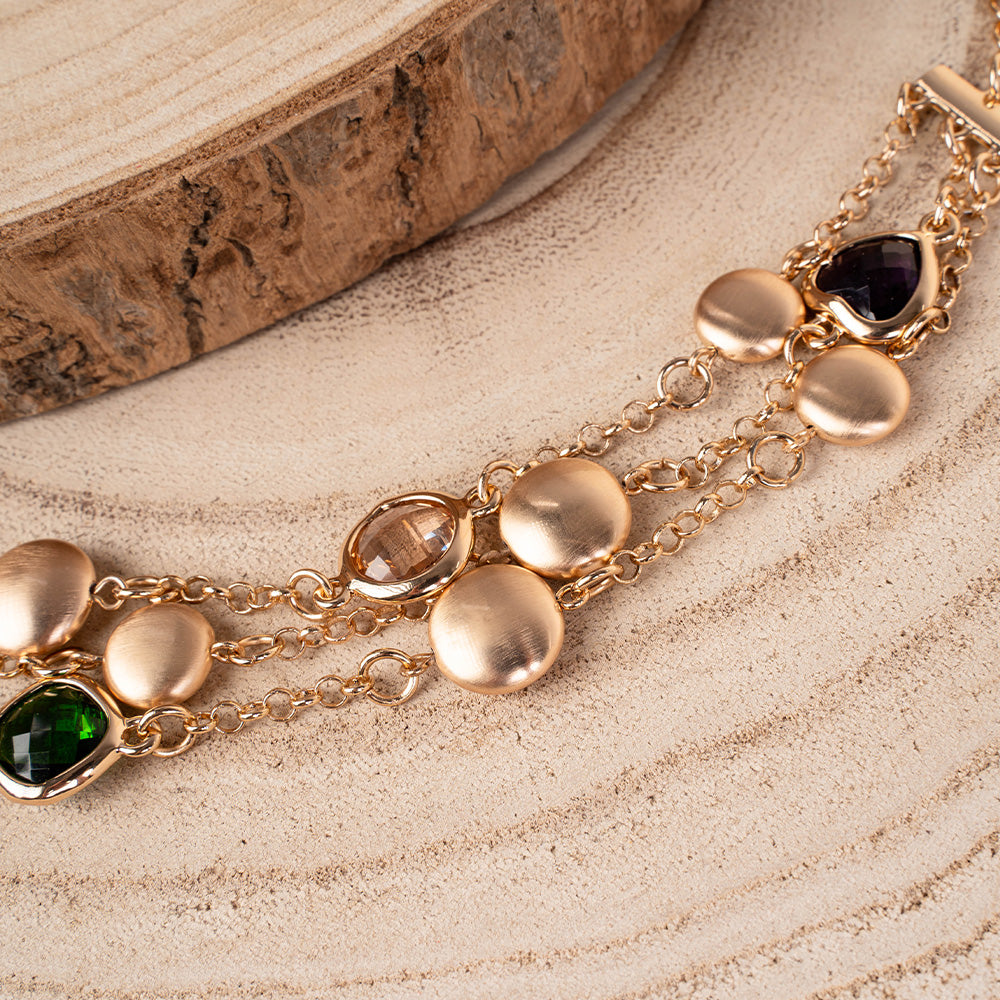 BRACCIALE A TRE FILI CON PIETRE E UNITA' SATINATE