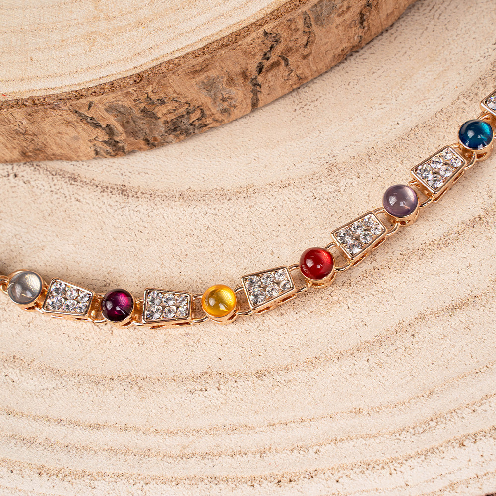 BRACCIALE CON PIETRE E UNITA' GEOMETRICHE CON STRASS