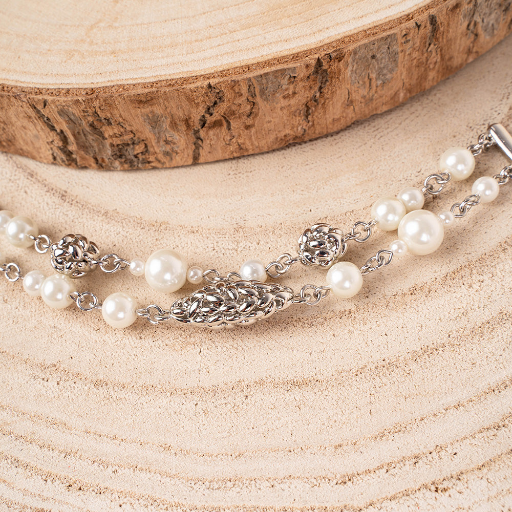 BRACCIALE A DUE FILI CON PERLE E  ELEMENTI LAVORATI