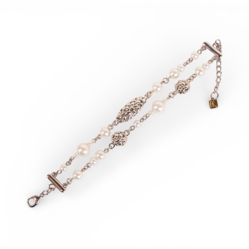 BRACCIALE A DUE FILI CON PERLE E  ELEMENTI LAVORATI