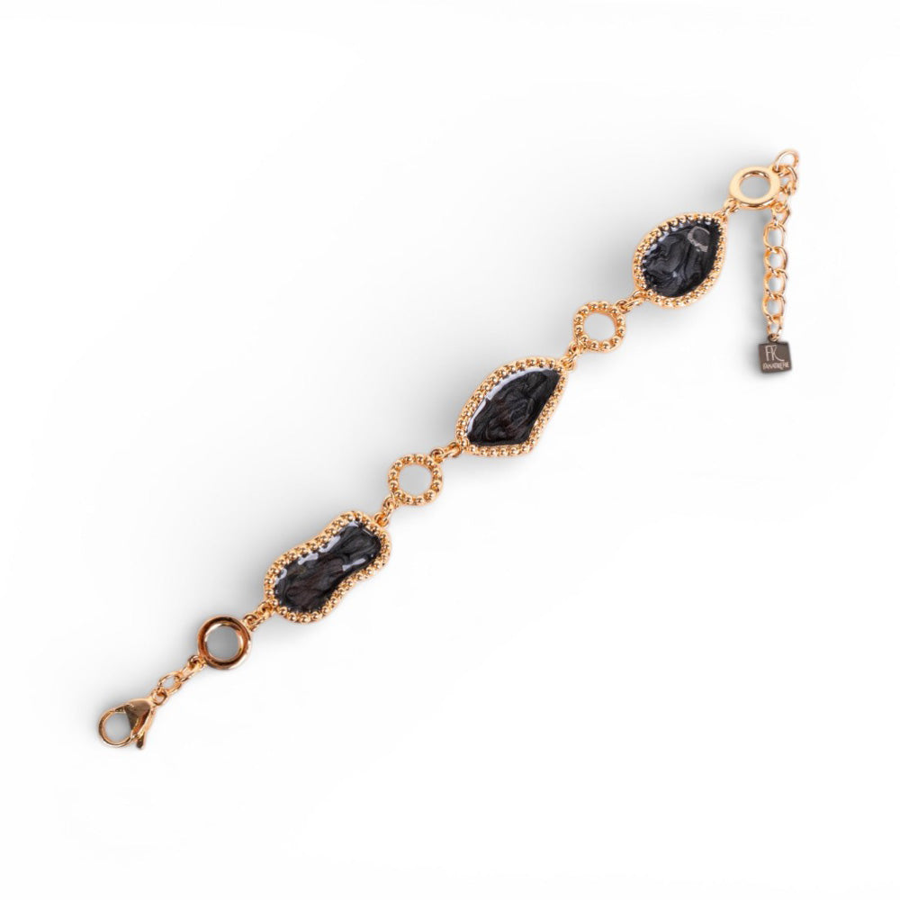 BRACCIALE CON ELEMENTI IN RESINA ASIMMETRICI