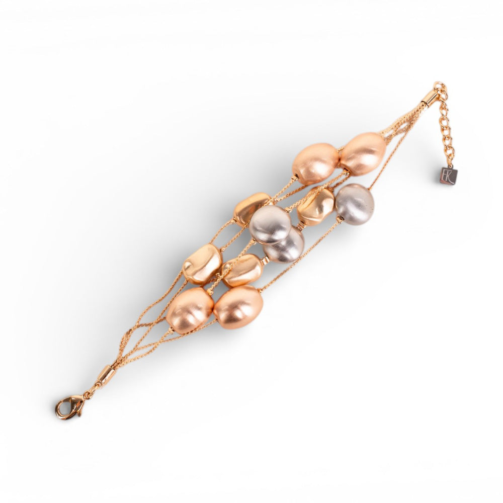 BRACCIALE MULTIFILO CON ELEMENTI SATINATI ASIMMETRICI