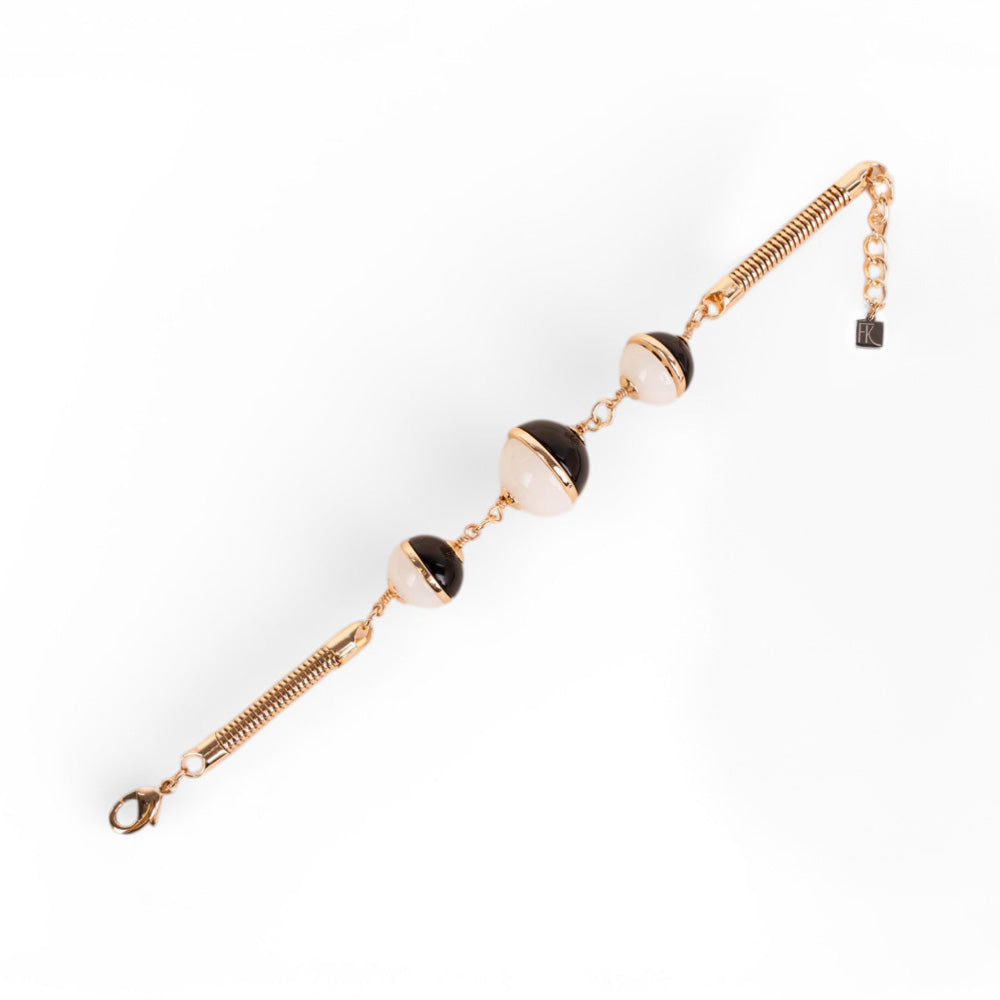 BRACCIALE CON TUBULARE E TRE SFERE DIVISE A META'