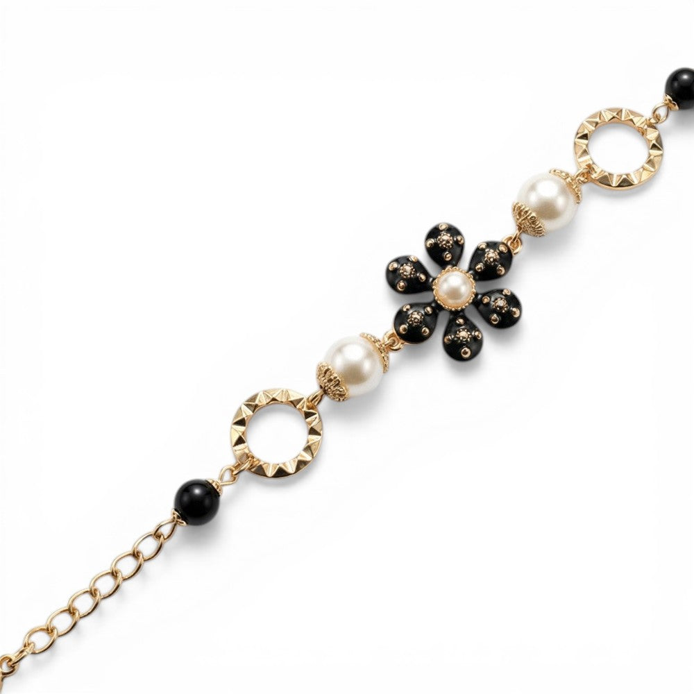 BRACCIALE CON FIORE CENTRALE E ELEMENTI DECORATIVI LATERALI