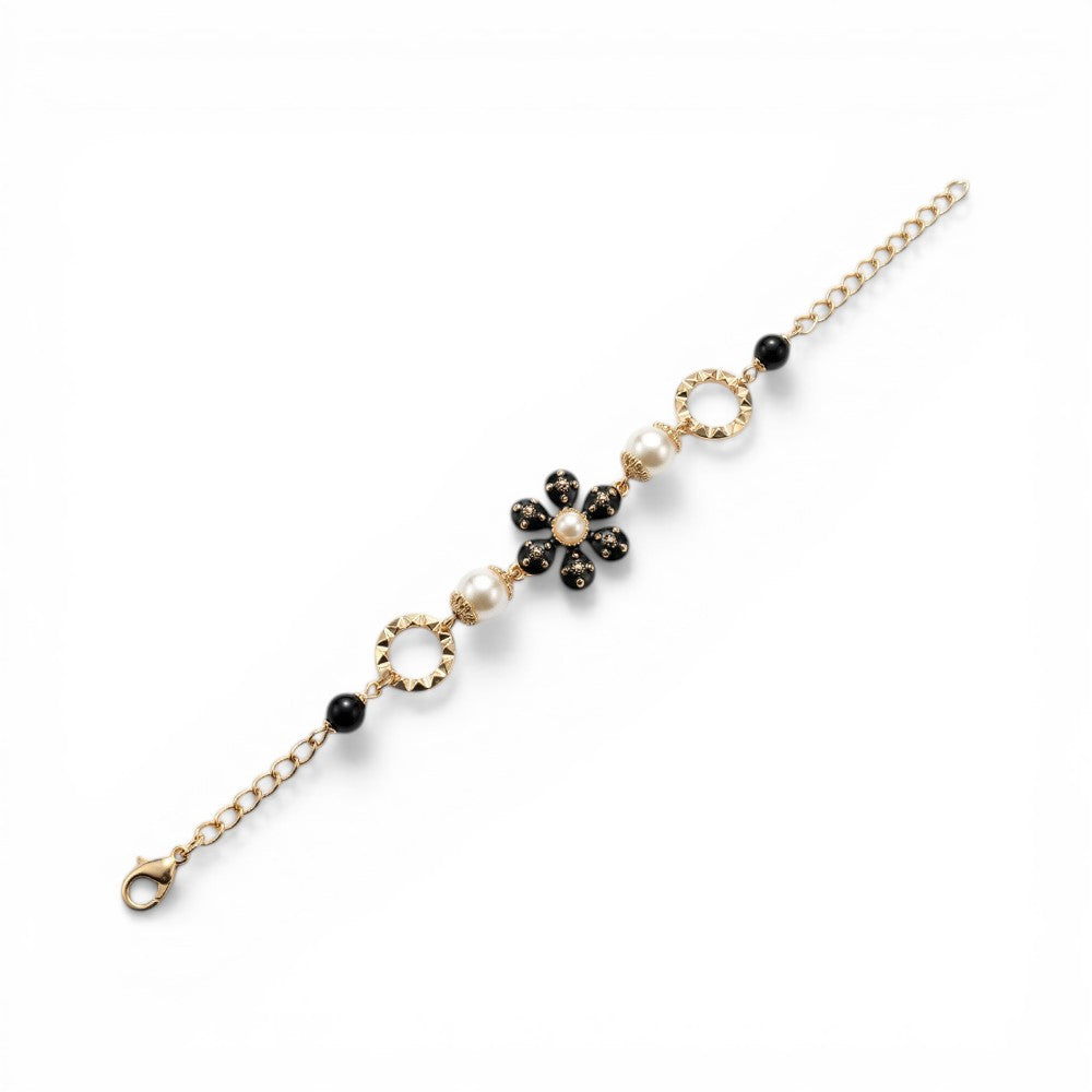 BRACCIALE CON FIORE CENTRALE E ELEMENTI DECORATIVI LATERALI