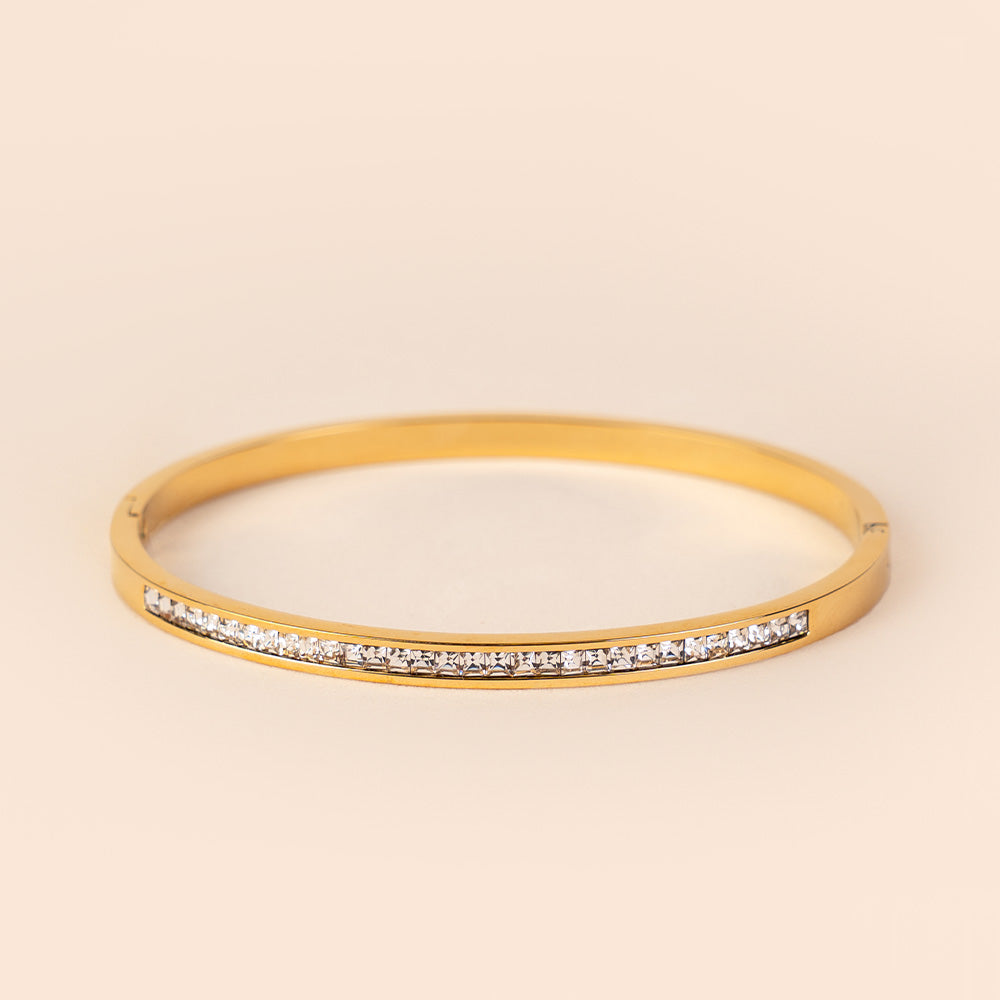 BRACCIALE RIGIDO CON FILA DI STRASS CENTRALE